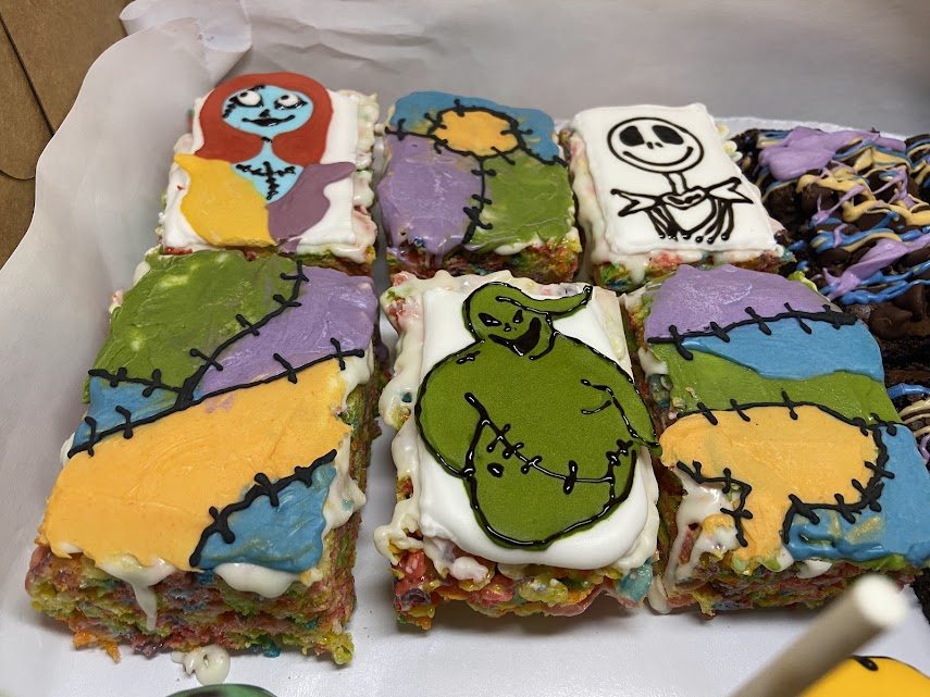 Cereal treats and chocolate-dipped pretzels with custom designs